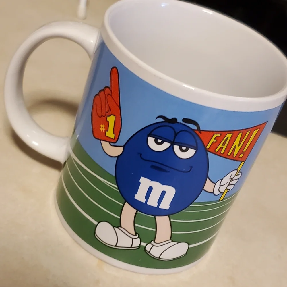 M&M coffee mug by Galerie cheerleader football